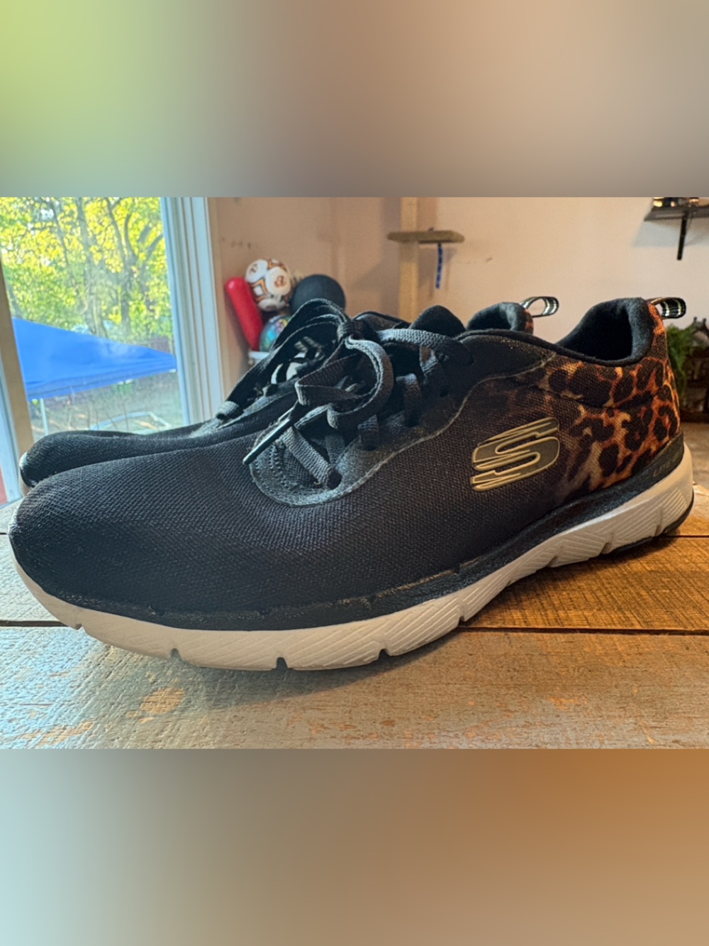 Skechers Women's Black Athletic Sneaker with Leopard Accent Size 7.5